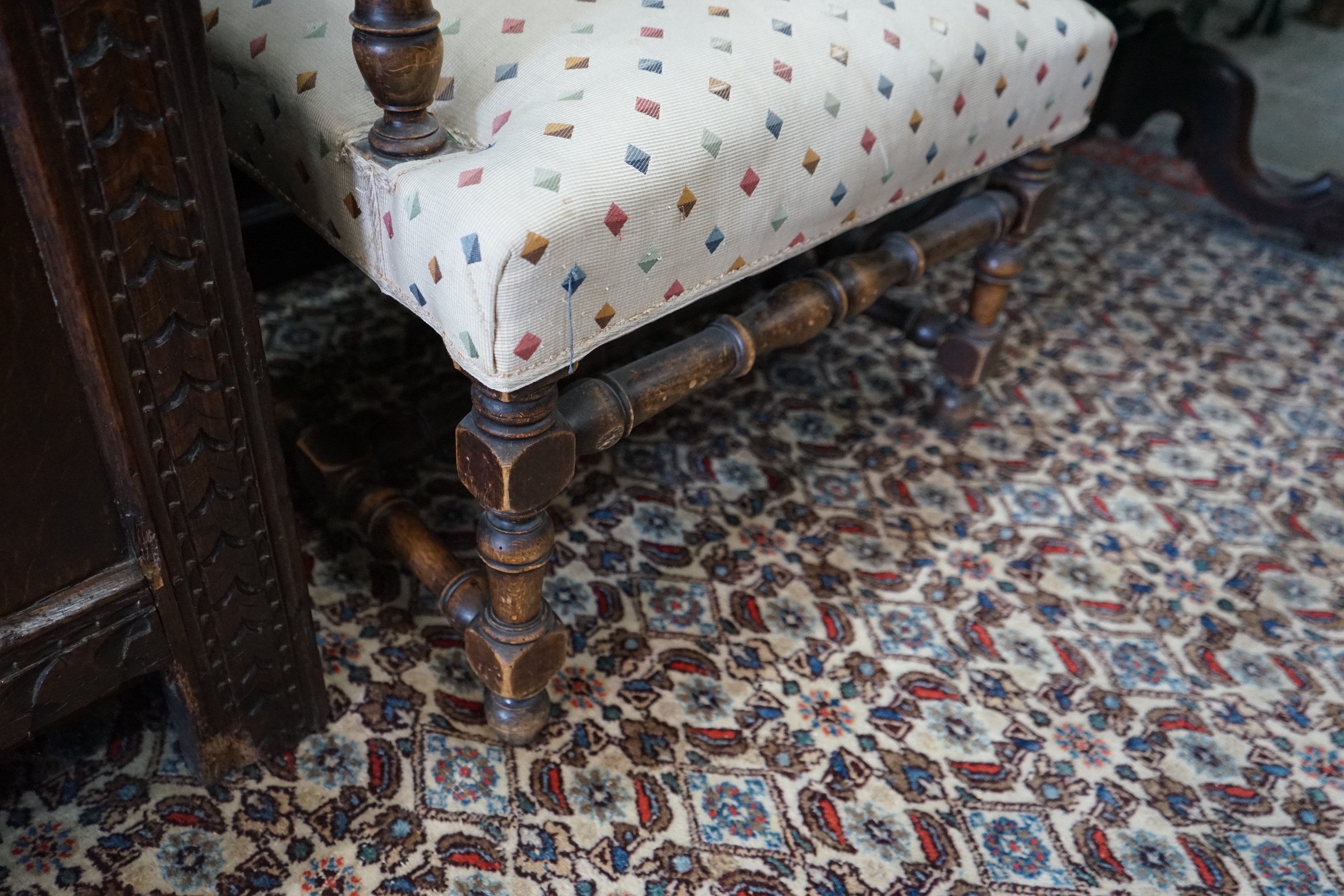 A French carved walnut upholstered elbow chair, width 61cm, depth 54cm, height 110cm
